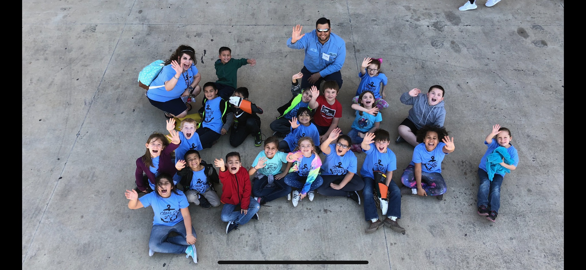 FELPS Lineman Joe waving with the class of 2028 at Floresville ISD's